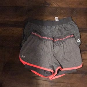 Under Amour and Reebok shorts with slider under